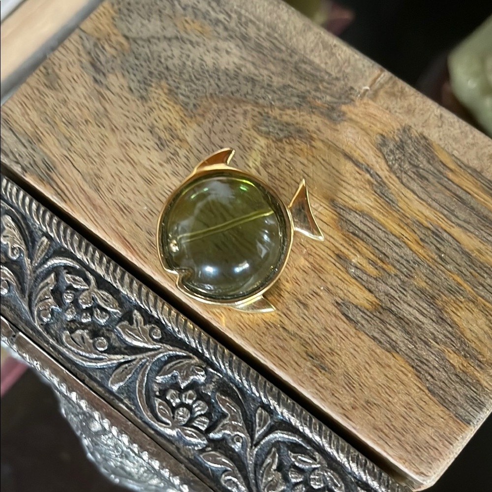 Gold Fish-Shaped Brooch with Green Gem